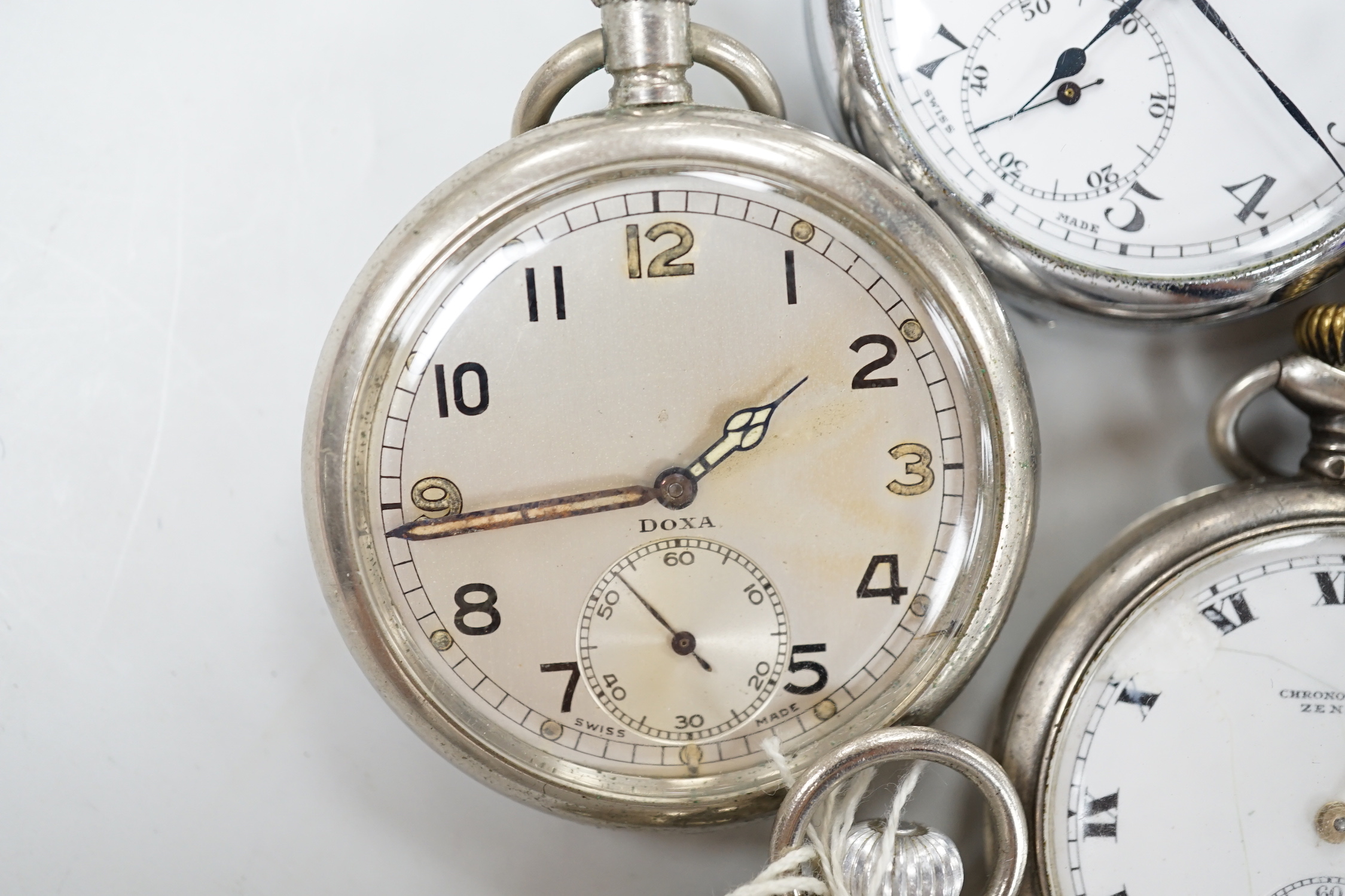 Eight assorted silver or base metal pocket watches including Goliath, Doxa and military black dial.